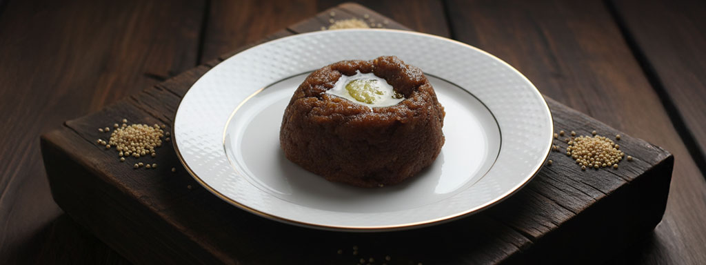 Simple and earthy Baadi made from roasted buckwheat or wheat flour mixed with hot water, served with ghee and Phaanu — a staple food of rural Uttarakhand.